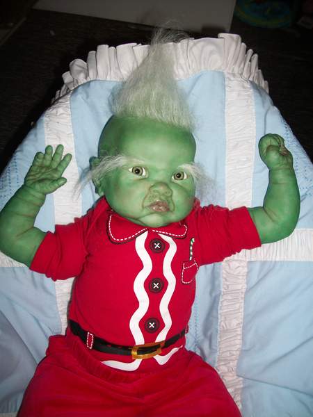 real life baby grinch doll